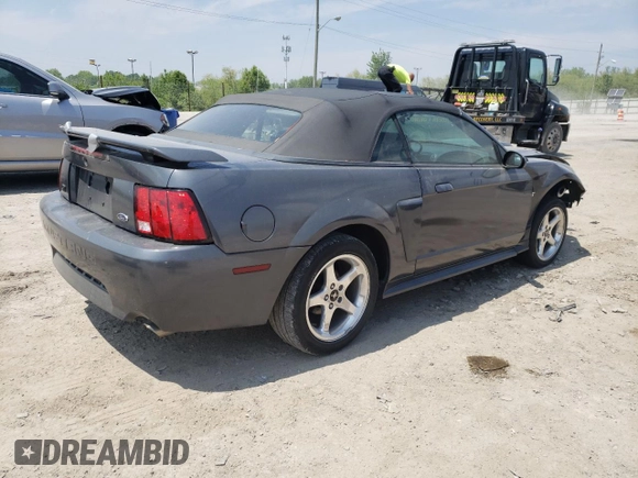 2003 Ford Mustang GT Deluxe with VIN 1FAFP45X43F387520, listed as a Copart auction lot 56302185 with 134,537 mi miles and Salvage title. Bid and sale history available at DreamBid. Image 3.