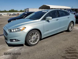 2014 Ford Fusion SE Hybrid z VIN 3FA6P0LUXER164566, wystawiony jako Copart lot #64900635 z przebiegiem 181 728 mil mil oraz Czysty tytuł • Clean title. Historia ofert i sprzedaży dostępna na DreamBid. Obrazek 1.