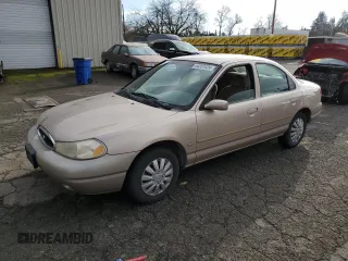 1998 Ford Contour SE z VIN 1FAFP6637WK280190, wystawiony jako Copart lot #84331424 z przebiegiem 185 754 mil mil oraz Tytuł czysty. Historia ofert i sprzedaży dostępna na DreamBid. Obrazek 1.
