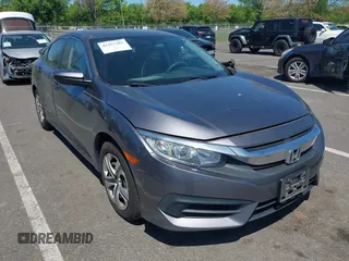 2017 Honda Civic LX z VIN 19XFC2F52HE203362, wystawiony jako IAAI lot #42157382 z przebiegiem 81 017 mil mil oraz . Historia ofert i sprzedaży dostępna na DreamBid. Obrazek 1.
