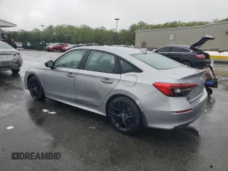 2022 Honda Civic Sport z VIN 2HGFE2F57NH597601, wystawiony jako Copart lot #55588515 z przebiegiem 12 576 mil mil oraz Szkoda całkowita • Salvage title. Historia ofert i sprzedaży dostępna na DreamBid. Obrazek 2.