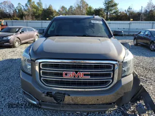 2015 GMC Yukon SLT with VIN 1GKS1BKC8FR664001, listed as a Copart auction lot 84391784 with 0 mi miles and Salvage Title. Bid and sale history available at carsss.com. Image 5.