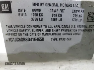 2013 Chevrolet Sonic LT with VIN 1G1JC5SB8D4164658, listed as a Copart auction lot 47059365 with 105,985 mi miles and Salvage Title. Bid and sale history available at DreamBid. Image 12.