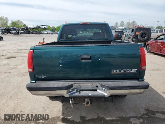 1998 Chevrolet Silverado 1500 with VIN 2GCEK19R4W1143733, listed as a Copart auction lot 54298895 with 210,091 mi miles and Salvage Title. Bid and sale history available at DreamBid. Image 6.