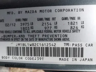 2012 Mazda 3 i Grand Touring with VIN JM1BL1W82C1612542, listed as a IAAI auction lot 41474870 with 28,434 mi miles and . Bid and sale history available at DreamBid. Image 9.