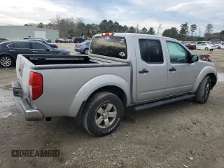 2010 Nissan Frontier SE with VIN 1N6AD0EV2AC405609, listed as a Copart auction lot 87615465 with 170,555 mi miles and Salvage title. Bid and sale history available at DreamBid. Image 3.