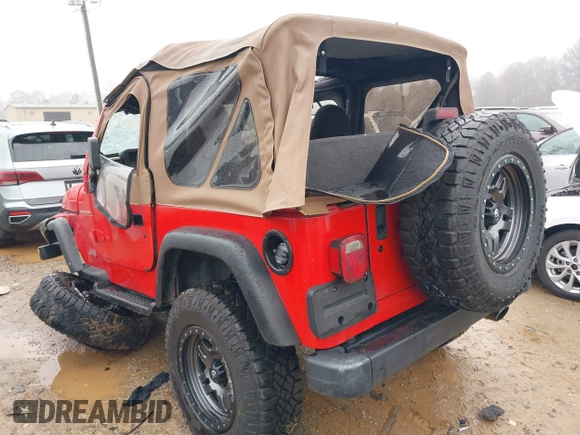 2000 Jeep Wrangler SE with VIN 1J4FA29P7YP793068, listed as a IAAI auction lot 41576287 with 113,298 mi miles. Bid and sale history available at carsss.com. Image 3.