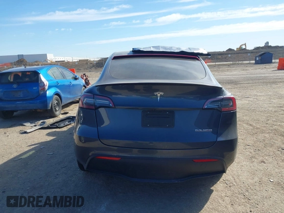 2022 Tesla Model Y Performance z VIN 7SAYGDEF8NF494753, wystawiony jako IAAI lot #41692464 z przebiegiem 14 616 mil mil oraz . Historia ofert i sprzedaży dostępna na DreamBid. Obrazek 16.