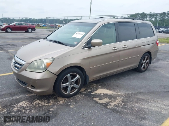 2007 Honda Odyssey Touring z VIN 5FNRL38867B076568, wystawiony jako IAAI lot #42355334 z przebiegiem 211 726 mil mil oraz . Historia ofert i sprzedaży dostępna na DreamBid. Obrazek 2.