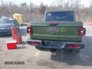 2023 Jeep Gladiator Rubicon with VIN 1C6JJTBGXPL586154, listed as a IAAI auction lot 41370352 with 11,207 mi miles and . Bid and sale history available at DreamBid. Image 16.