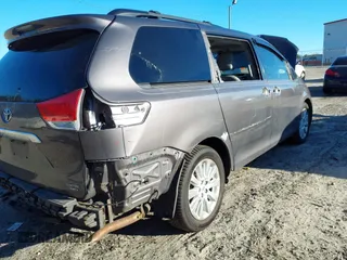 2011 Toyota Sienna XLE with VIN 5TDDK3DC8BS009739, listed as a IAAI auction lot 41638710 with 235,396 mi miles. Bid and sale history available at carsss.com. Image 6.