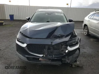 2020 Mazda CX-30 Premium z VIN 3MVDMBEM8LM121954, wystawiony jako Copart lot #51322965 z przebiegiem Nie podano mil oraz Nie do naprawy • Non repairable. Historia ofert i sprzedaży dostępna na DreamBid. Obrazek 5.