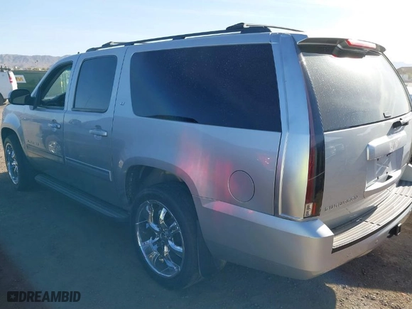 2013 Chevrolet Suburban LT with VIN 1GNSCJE04DR276690, listed as a IAAI auction lot 41725311 with 251,888 mi miles. Bid and sale history available at carsss.com. Image 3.
