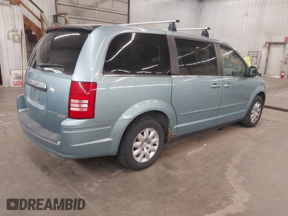 2010 Chrysler Town & Country LX with VIN 2A4RR4DE1AR285996, listed as a IAAI auction lot 42236641 with 165,772 mi miles and . Bid and sale history available at DreamBid. Image 4.