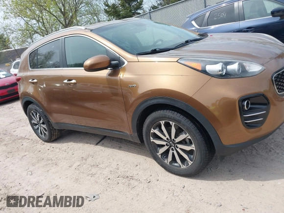 2017 Kia Sportage EX z VIN KNDPNCAC3H7113373, wystawiony jako IAAI lot #42221002 z przebiegiem 112 931 mil mil oraz . Historia ofert i sprzedaży dostępna na DreamBid. Obrazek 13.