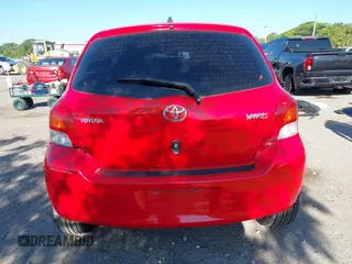 2009 Toyota Yaris with VIN JTDJT903695234623, listed as a IAAI auction lot 42027852 with 146,000 mi miles. Bid and sale history available at carsss.com. Image 16.