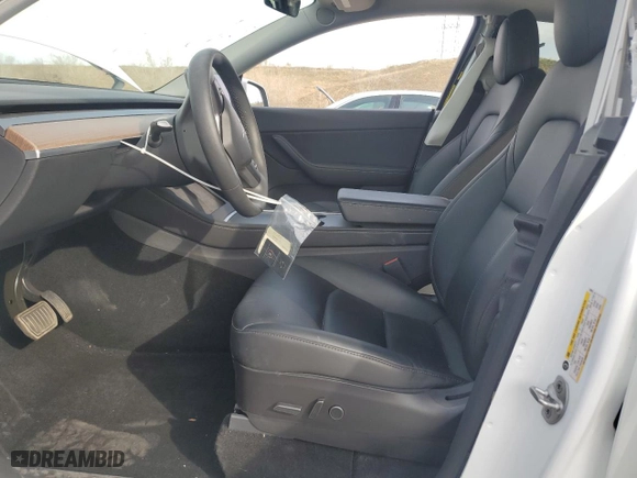 2021 Tesla Model Y Long Range with VIN 5YJYGDEEXMF299515, listed as a Copart auction lot 51978555 with 30,459 mi miles and Salvage Title. Bid and sale history available at carsss.com. Image 7.