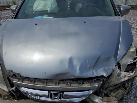 2005 Honda Odyssey EX-L with VIN 5FNRL38765B088756, listed as a Copart auction lot 57071365 with 243,277 mi miles and Salvage title. Bid and sale history available at DreamBid. Image 11.