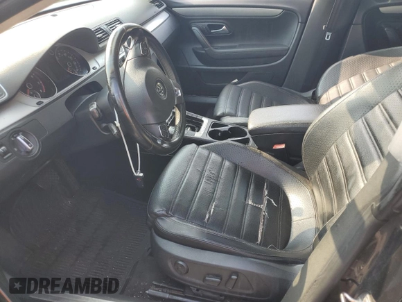 2014 Volkswagen CC R-Line with VIN WVWBP7AN2EE507967, listed as a Copart auction lot 65423594 with 121,212 mi miles and Salvage Title. Bid and sale history available at carsss.com. Image 7.
