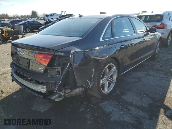 2012 Audi A8 with VIN WAURVAFD8CN004536, listed as a Copart auction lot 45173125 with 143,000 mi miles and Salvage title. Bid and sale history available at DreamBid. Image 3.