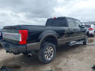 2017 Ford Super Duty F-250 SRW Lariat with VIN 1FT7W2BT7HEC14644, listed as a IAAI auction lot 41449381 with 125,963 mi miles. Bid and sale history available at carsss.com. Image 4.
