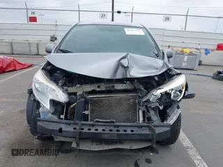 2014 Nissan Note SV z VIN 3N1CE2CP3EL394433, wystawiony jako IAAI lot #42421291 z przebiegiem 100 966 mil mil oraz . Historia ofert i sprzedaży dostępna na DreamBid. Obrazek 13.