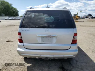 2004 Mercedes-Benz M-Class with VIN 4JGAB75EX4A470494, listed as a Copart auction lot 52024515 with 185,639 mi miles and Salvage Title. Bid and sale history available at carsss.com. Image 6.
