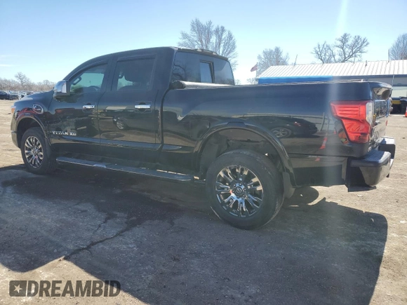 2017 Nissan Titan Pro-4X z VIN 1N6BA1F43HN557633, wystawiony jako Copart lot #46501645 z przebiegiem 94 325 mil mil oraz Szkoda całkowita • Salvage title. Historia ofert i sprzedaży dostępna na DreamBid. Obrazek 2.
