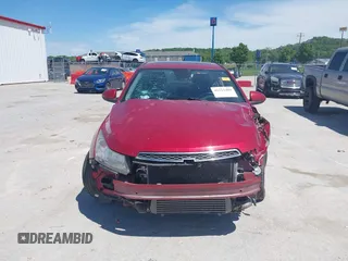 2014 Chevrolet Cruze 2LT z VIN 1G1PE5SB2E7402735, wystawiony jako IAAI lot #42213480 z przebiegiem 144 245 mil mil oraz . Historia ofert i sprzedaży dostępna na DreamBid. Obrazek 13.