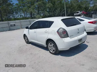 2010 Pontiac Vibe w/1SB with VIN 5Y2SP6E05AZ419359, listed as a IAAI auction lot 42069513 with 223,817 mi miles. Bid and sale history available at carsss.com. Image 3.