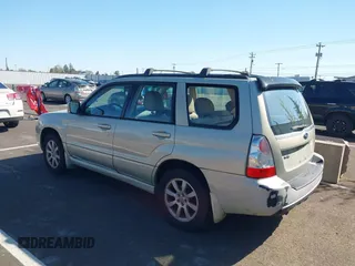2007 Subaru Forester X w/Premium Pkg with VIN JF1SG65647H721895, listed as a IAAI auction lot 42034626 with 163,078 mi miles. Bid and sale history available at carsss.com. Image 3.