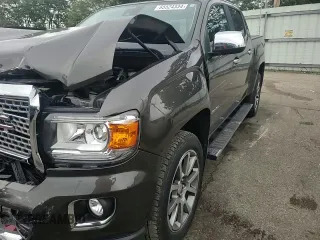 2019 GMC Canyon 4WD Denali with VIN 1GTG6EENXK1200430, listed as a Copart auction lot 65524334 with 54,813 mi miles and Salvage Title. Bid and sale history available at carsss.com. Image 11.