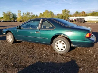 1995 Ford Thunderbird LX z VIN 1FALP6248SH176946, wystawiony jako Copart lot #74066554 z przebiegiem 72 666 mil mil oraz Szkoda całkowita • Salvage title. Historia ofert i sprzedaży dostępna na DreamBid. Obrazek 2.