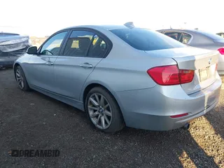 2013 BMW 3 Series 320i with VIN WBA3B1C53DK128079, listed as a IAAI auction lot 41316846 with 138,559 mi miles. Bid and sale history available at carsss.com. Image 3.