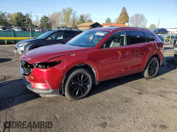 2022 Mazda CX-9 Touring Plus z VIN JM3TCBAY2N0628189, wystawiony jako Copart lot #55663825 z przebiegiem 56 511 mil mil oraz Szkoda całkowita • Salvage title. Historia ofert i sprzedaży dostępna na DreamBid. Obrazek 1.