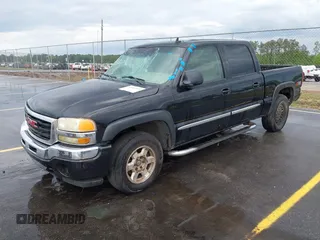 2006 GMC Sierra 1500 SLT with VIN 2GTEK13T561232618, listed as a IAAI auction lot 42086899 with 310,473 mi miles and . Bid and sale history available at carsss.com. Image 2.