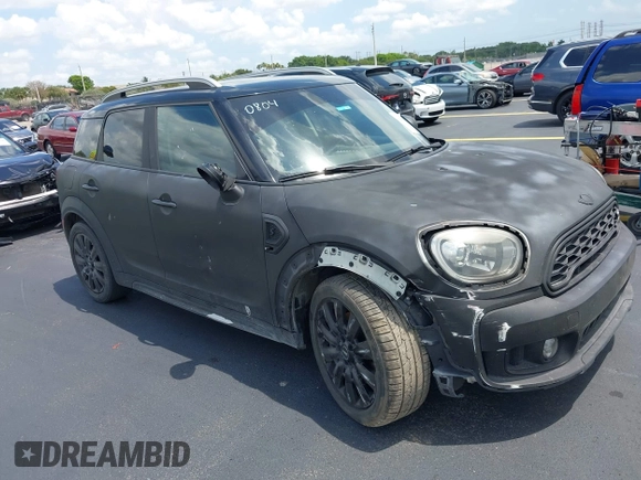 2018 MINI Countryman Cooper S z VIN WMZYT3C35J3E00804, wystawiony jako IAAI lot #42194381 z przebiegiem 101 634 mil mil oraz . Historia ofert i sprzedaży dostępna na DreamBid. Obrazek 6.
