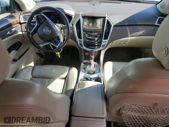 2014 Cadillac SRX Premium Collection z VIN 3GYFNGE31ES615593, wystawiony jako Copart lot #56785775 z przebiegiem 247 230 mil mil oraz Tytuł czysty. Historia ofert i sprzedaży dostępna na DreamBid. Obrazek 8.