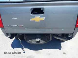 2020 Chevrolet Colorado 2WD Work Truck z VIN 1GCGSBEN5L1119170, wystawiony jako IAAI lot #41865912 z przebiegiem 99 896 mil mil oraz . Historia ofert i sprzedaży dostępna na DreamBid. Obrazek 6.
