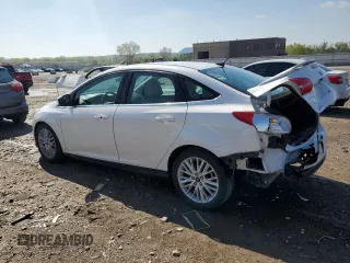 2018 Ford Focus Titanium with VIN 1FADP3J21JL294061, listed as a Copart auction lot 53827375 with 194,577 mi miles and Salvage title. Bid and sale history available at DreamBid. Image 2.