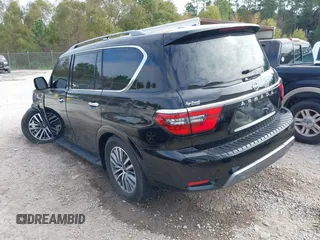 2021 Nissan Armada SV with VIN JN8AY2AC2M9147265, listed as a IAAI auction lot 40966883 with 51,187 mi miles. Bid and sale history available at carsss.com. Image 3.