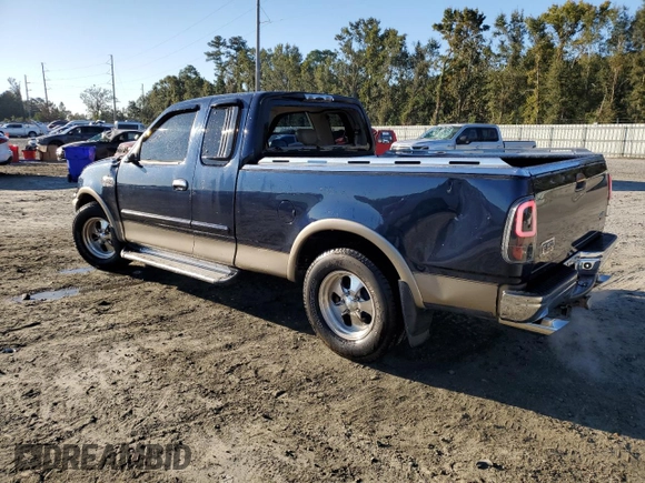 2002 Ford F-150 XL with VIN 1FTRX17L72NA39909, listed as a Copart auction lot 76376994 with 175,926 mi miles and Salvage title. Bid and sale history available at DreamBid. Image 2.