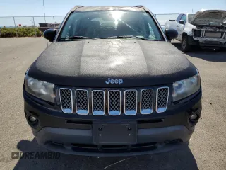 2014 Jeep Compass High Altitude with VIN 1C4NJCEA0ED529504, listed as a Copart auction lot 42349445 with 90,705 mi miles and Clean Title. Bid and sale history available at carsss.com. Image 5.