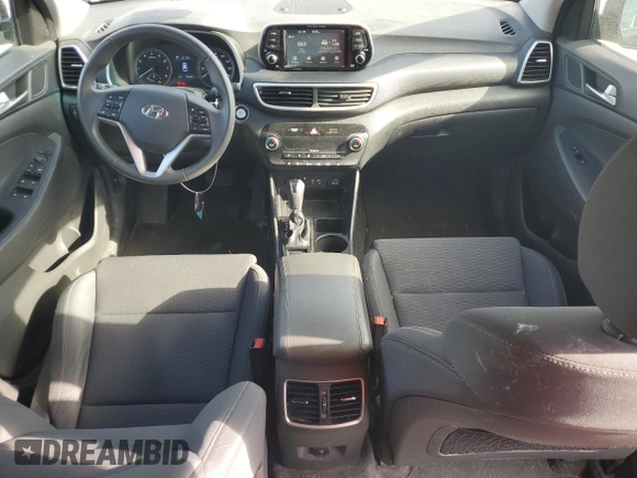 2020 Hyundai Tucson SEL z VIN KM8J33AL9LU148601, wystawiony jako Copart lot #54865805 z przebiegiem 108 868 mil mil oraz Czysty tytuł • Clean title. Historia ofert i sprzedaży dostępna na DreamBid. Obrazek 8.