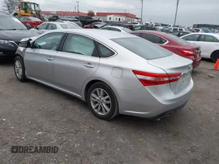 2014 Toyota Avalon Limited with VIN 4T1BK1EB8EU133085, listed as a IAAI auction lot 40949898 with 126,697 mi miles. Bid and sale history available at carsss.com. Image 3.