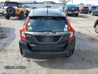2015 Honda Fit EX-L z VIN 3HGGK5H8XFM700714, wystawiony jako Copart lot #79183164 z przebiegiem 40 648 mil mil oraz Nie do naprawy. Historia ofert i sprzedaży dostępna na DreamBid. Obrazek 6.