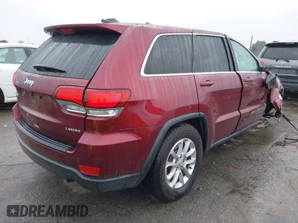 2021 Jeep Grand Cherokee Laredo X with VIN 1C4RJEAG4MC681989, listed as a IAAI auction lot 41571341 with 61,090 mi miles and . Bid and sale history available at DreamBid. Image 4.