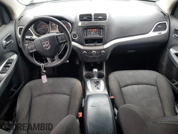 2018 Dodge Journey SE with VIN 3C4PDCAB6JT517988, listed as a Copart auction lot 48103275 with 129,897 mi miles and Salvage Title. Bid and sale history available at DreamBid. Image 8.
