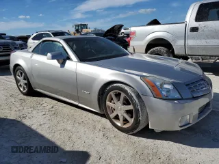 2005 Cadillac XLR z VIN 1G6YV34A455601742, wystawiony jako Copart lot #77878544 z przebiegiem Nie podano mil oraz Szkody całkowita. Historia ofert i sprzedaży dostępna na DreamBid. Obrazek 4.