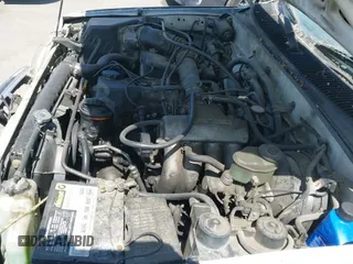 1999 Toyota Tacoma with VIN 4TAVL52NXXZ454003, listed as a IAAI auction lot 42626976 with 484,538 mi miles and . Bid and sale history available at DreamBid. Image 16.